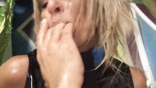 The skank gets her cunt spread with her hands sex