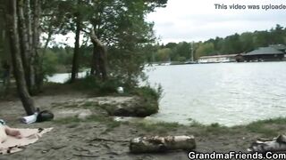 Bombshell grandmother 3 way with boys on the beach