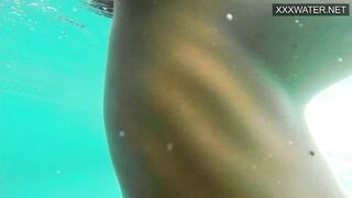 Amelie Bruna Yummy Dark Haired with Huge Boobs inside the Pool