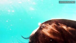 Amelie Bruna Yummy Dark Haired with Huge Boobs inside the Pool