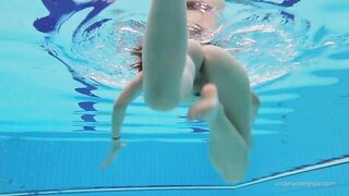 Red swimsuit babe Katy with hairy twat underwater