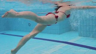 Red swimsuit babe Katy with hairy twat underwater