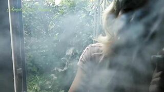 Raining, half Naked Blonde Hoe Smoking into Garden Outdoors