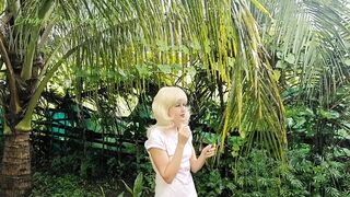Raining, half Naked Blonde Hoe Smoking into Garden Outdoors