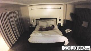 Goddess Jezebelle Bond hangs out into her hotel room