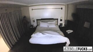 Goddess Jezebelle Bond hangs out into her hotel room