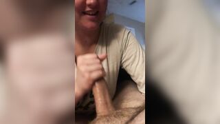 Blowing while Husband Watches TV