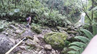 Bro Walks Trail to Waterfall