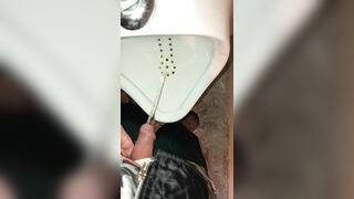 bimbos Pee inside a Urinal & her Hubby Gets to Witness it first Hand as he Pisses right after her
