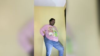 African Beauty Soaks Jeans