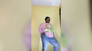 African Beauty Soaks Jeans