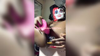 Skinny African does double penetration and Ejaculates with her Harley Mask on