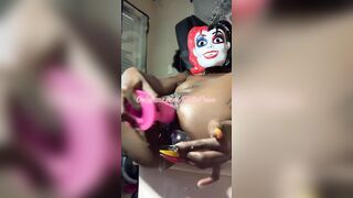 Skinny African does double penetration and Ejaculates with her Harley Mask on