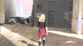 Slick #1 - A pvc clad female terrorizes Los Angeles