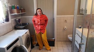 Getting Clothed inside Ella Rainpants and Hunter Boots