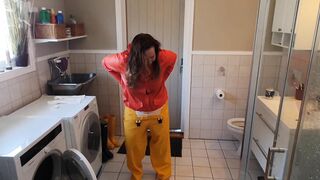 Getting Clothed inside Ella Rainpants and Hunter Boots