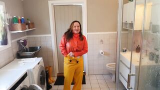 Getting Clothed inside Ella Rainpants and Hunter Boots