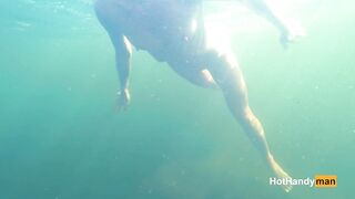 Nude cougar Swimming into the River with her Dogs (underwater