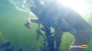 Nude cougar Swimming into the River with her Dogs (underwater