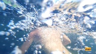 Nude cougar Swimming into the River with her Dogs (underwater