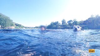 Nude cougar Swimming into the River with her Dogs (underwater