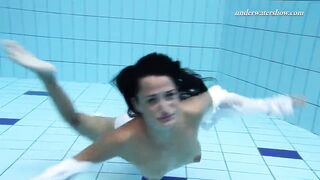 Underwater swimming stripping Beauty Zhanetta