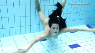 Underwater swimming stripping Beauty Zhanetta