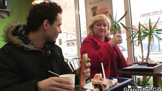 Young guy picks up big older grandmother for play
