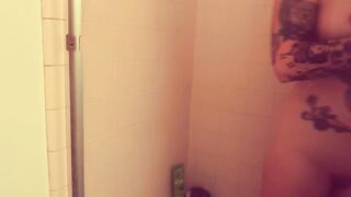 Inked milf finger fucked herself & jizzes inside shower