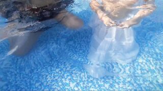 Girls Shaking Jugs Inside The Pool