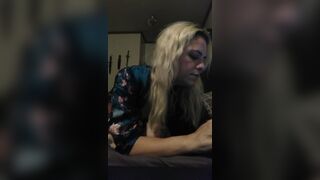 Smokes a joint, plays with herself, and answers message from work on phone