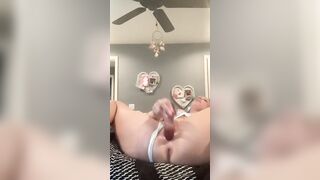 Fucks and squirts all over herself