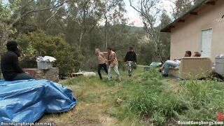 Tied women plowed by Hillbillies