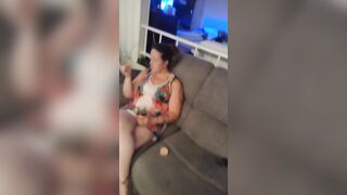 Super Sexy women smokes into night dress on the couch part three