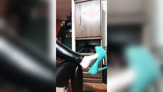 Ferralyn dangles her heels