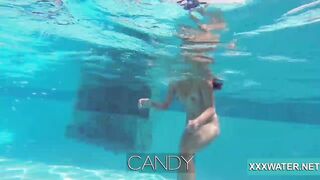 Bae dark hair skank Candy swims underwater