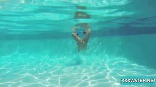 Bae dark hair skank Candy swims underwater
