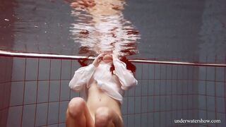 Huge jugs red haired Lola underwater naked