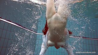 Huge jugs red haired Lola underwater naked