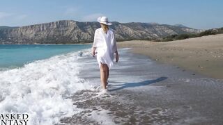 Hot woman with a filthy twat at a secluded beach with view through white top