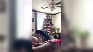 Quick Corona Christmas fucked on couch inside front of tree. Suck and cowgirl nailed