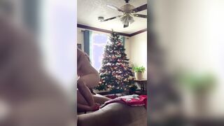 Quick Corona Christmas fucked on couch inside front of tree. Suck and cowgirl nailed