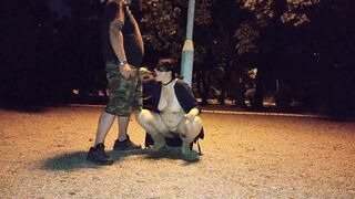 A submisive bimbo takes a piss inside her mouth into a outdoors park