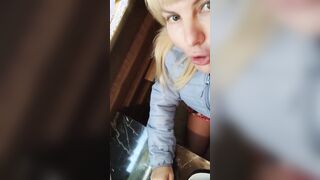 Risky sexy shows sweet twat inside café