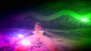 Hot bimbo frolics inside the Swimming Pool of a nightclub