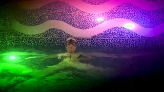 Hot bimbo frolics inside the Swimming Pool of a nightclub