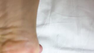 smelling her super sexy toes bound with gold chain and soaked with milk