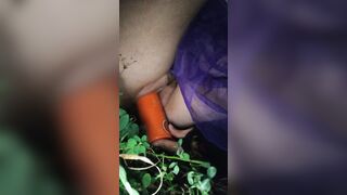 Pushing a can inside my snatch into the dark, outdoors