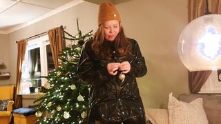 Decorating Christmas tree into rainwear, rubber pants and latex boots