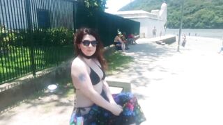 beauty vagina with mouth flashing her body in summer city. She was